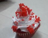 A picture of step 4 of Red cup cakes with chocolate center.