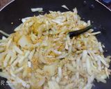A picture of step 7 of Moong Dal Diye Lau Ghonto.