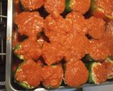 A picture of step 2 of Stuffed Bell Peppers in a Red Sauce.