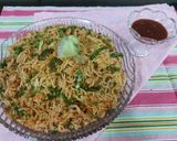 A picture of step 4 of Singapore chicken noodles rice.