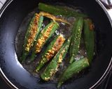 A picture of step 4 of Stuffed Kurmuri Bhindi Shallow fry.