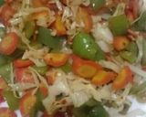 A picture of step 9 of Spicy BBQ chicken ricewith stir fry vegetables.