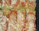Foto del paso 6 de la receta: Canelones rellenos de arroz con pollo, y queso y jamón