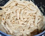A picture of step 10 of Penne alfredo pasta.