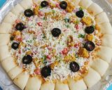 A picture of step 3 of Cheesy Bites Tikka Pizza 🍕🍕.