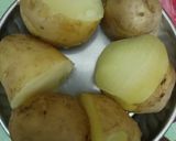 A picture of step 2 of Suki bhaji (potato sabji).