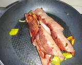 Foto del paso 5 de la receta: Rollitos de mortadella con zanahoria, pimiento y cebolla