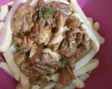 A picture of step 6 of Chicken loaded fries.