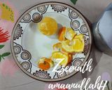 A picture of step 1 of Coconut Milk and Orange Panna Cotta.