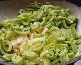 A picture of step 2 of Snake Gourd / Padwal sabji.