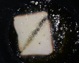 A picture of step 11 of Laddu stuffing bread puwa.