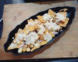 A picture of step 3 of Creamy Fried chicken Nachos.