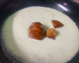 A picture of step 2 of Nolen Gurer Rasogollar Payesh.