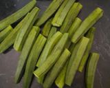 A picture of step 1 of Kurkuri Bhindi fry.