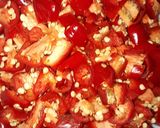 A picture of step 1 of Sliced Red Chili Pickle.