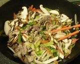 A picture of step 3 of Authentic Spring Rolls with lots of Veggies.