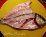 Foto del paso 2 de la receta: Dorada al horno, con patatas y ajos