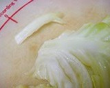 A picture of step 1 of Stuffed Cabbage with Egg.