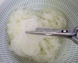 A picture of step 4 of Stir-fried Bifun Noodles with lots of Spring Cabbage and Sweet Onions.