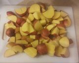 A picture of step 1 of Baked Potatoes & Sausage.