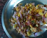 A picture of step 5 of Tangy Bitter gourd(Karela) stuffed with mango.