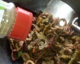 Foto langkah ke 4 dari resep Cumi Pare Tumis Oregano.