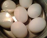 A picture of step 1 of Egg avocado and olive salad.
