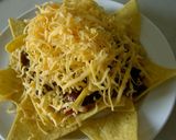 A picture of step 3 of Nachos with Chili Con Carne.