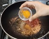 A picture of step 10 of Stuffed Chilli Curry.