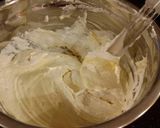 A picture of step 11 of Vanilla Layer Cake with Lemon Cream Filling and Lemon Whipped Cream Frosting.