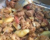 A picture of step 6 of Gosht aloo.