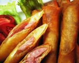 A picture of step 9 of Easy Spring Rolls with Cheese and Wieners.