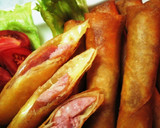 A picture of step 9 of Easy Spring Rolls with Cheese and Wieners.