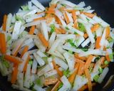A picture of step 3 of Daikon Radish Skin and Carrot Kinpira.