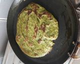 A picture of step 7 of Palak ka multigrain chila/ multigrain spinach pancake.
