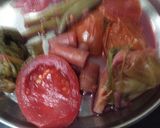 A picture of step 1 of Tomato carrot soup.