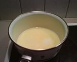 A picture of step 1 of Cream Cheese and Cranberry Buns.