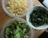 A picture of step 1 of Takuan (Yellow Pickled Daikon), Cucumber & Shiso Leaves Pasta.