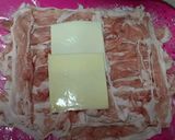 A picture of step 2 of Layered Pork "Steak" with Cheese using Thinly Sliced Pork Offcuts.