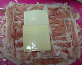 A picture of step 2 of Layered Pork "Steak" with Cheese using Thinly Sliced Pork Offcuts.
