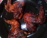 A picture of step 8 of Sticky but crunchy honey, pineapple,BBQ wings..