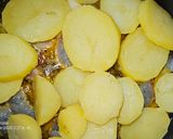 Foto del paso 7 de la receta Patatas confitadas al aroma de langostinos al ajillo