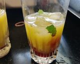 A picture of step 3 of Pineapple lychee orange mojito.