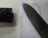 A picture of step 8 of Spiral Onigiri Rice Balls.