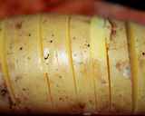 A picture of step 3 of Sig's Humbles ( hasselback potatoes).