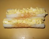 A picture of step 2 of Chikuwa and Egg Wrapped in Bacon.
