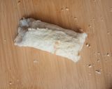 A picture of step 5 of Paneer chicken bread roll.