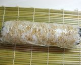 A picture of step 8 of California Rolls with Cream Cheese.