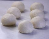 A picture of step 7 of White Bread Rolls of Happiness Using Fresh Cream.
