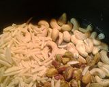 A picture of step 1 of Fried nuts and rice.